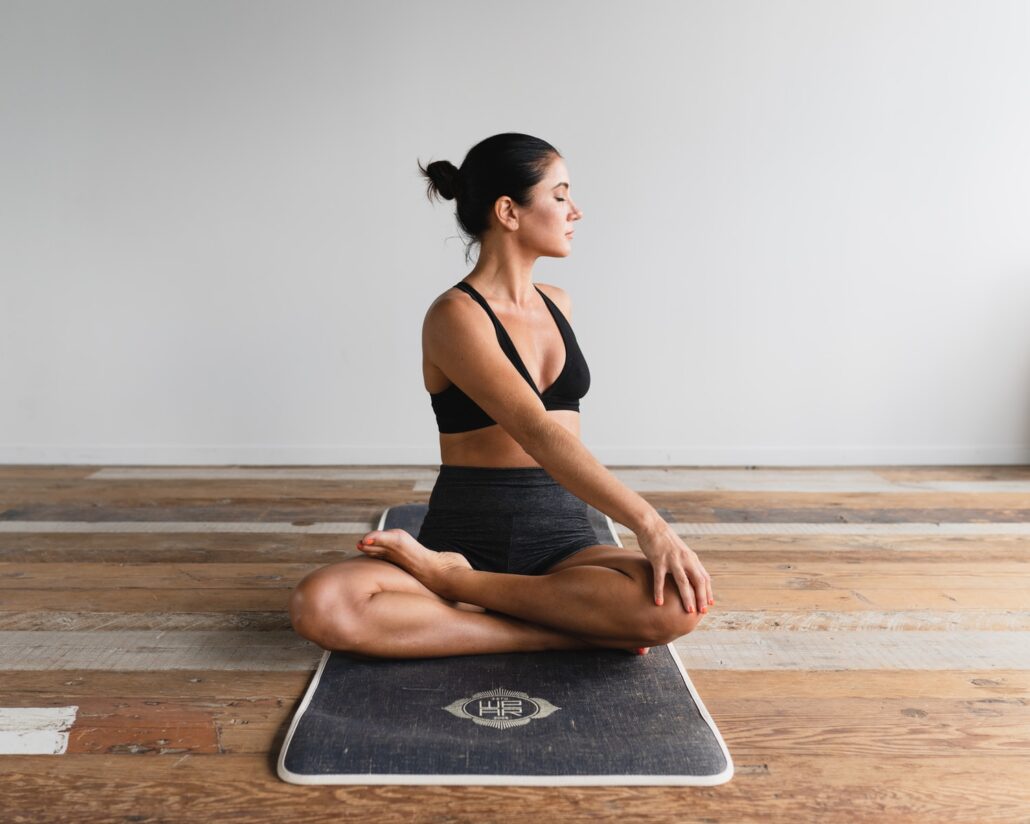 A Guide for Inflexible Guys to Working Out with Yoga 2 woman performing yoga
